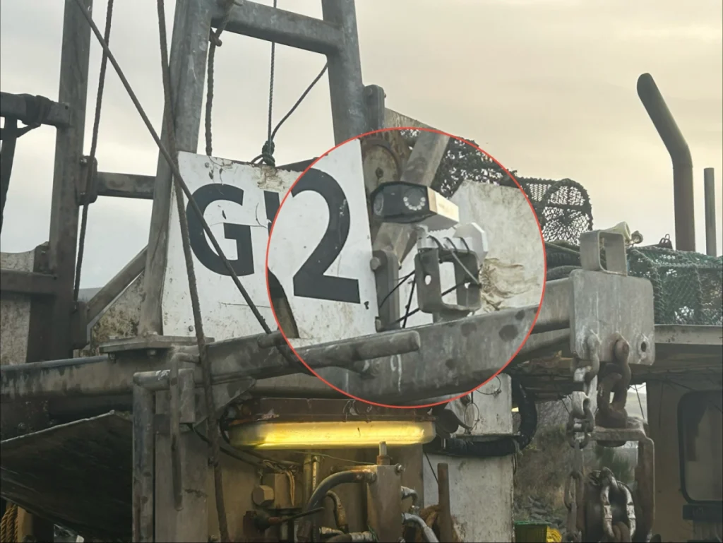 A CatchCam - Yatina wildlife monitoring camera mounted on the rear gantry of the fishing vessel Eilidh Anne.